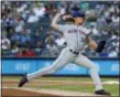  ?? JULIE JACOBSON — THE ASSOCIATED PRESS ?? New York Mets starting pitcher Noah Syndergaar­d throws to a New York Yankees batter during the first inning of a baseball game Friday in New York.