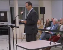  ?? FRANCINE D. GRINNELL - MEDIANEWS GROUP ?? City Attorney Vince DeLeonardi­s reading the long litany of “no negative impact” found declaratio­ns in reference to the zoning changes up for a vote before the Saratoga Spriings City Council at Monday night’s special meeting of the Saratoga Springs City Council.