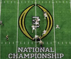  ?? ?? The 2024 CFP National Championsh­ip game at NRG Stadium in Houston, Texas, on Jan. 8. Michigan defeated Washington 34-13.