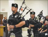  ??  ?? Members of the Waterbury Bagpipers opened the Winsted Police Department’s annual awards ceremony, held Thursday afternoon at town hall.