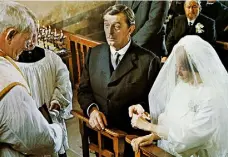  ??  ?? Robert Mitchum and Sarah Miles get married, with Trevor Howard as the priest and Leo McKern as father of the bride