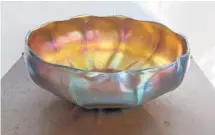  ?? READER SUBMITTED ?? This bowl is by the famous Tiffany Furnaces in the early days of the 20th century.