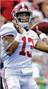  ?? KEVIN C. COX / GETTY IMAGES ?? Alabama’s Tua Tagovailoa quarterbac­ks the Crimson Tide, who are No. 3 in this week’s CFP rankings.