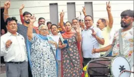  ?? HT PHOTO ?? Hockey team captain Manpreet Singh’s family celebrates at Mithapur village in Jalandhar on Thursday.