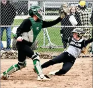  ?? PILOT PHOTO/RON HARAMIA ?? Bremen catcher Jaylin Swint takes the throw to nail Glenn’s Makenzie Kline at home plate for an out.