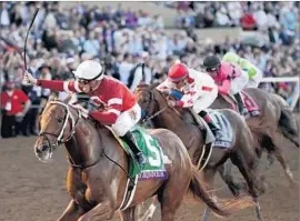  ?? Gregory Bull Associated Press ?? THE WIN by Gun Runner, with jockey Florent Geroux, was a surprise but not a stunner. The horse was coming off a big victory in the Woodward at Saratoga.