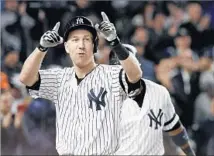  ?? Justin Lane European Pressphoto Agency ?? THIRD BASEMAN Todd Frazier of the New York Yankees rejoices after hitting a three-run home run in the second inning.