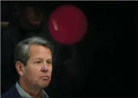  ?? BRYNN ANDERSON - THE ASSOCIATED PRESS ?? Georgia Gov. Brian Kemp speaks during a news conference at the State Capitol on Saturday, April 3, 2021, in Atlanta, about Major League Baseball’s decision to pull the 2021 All-Star Game from Atlanta over the league’s objection to a new Georgia voting law.