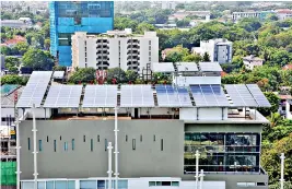  ??  ?? File picture of solar panels on a roof top.