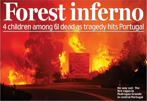  ??  ?? No way out: The fire rages in Pedrogao Grande in central Portugal