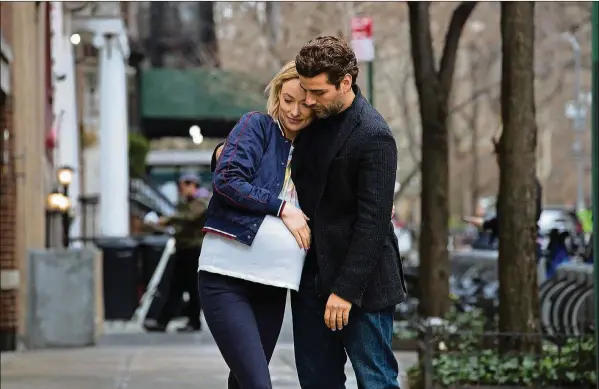  ?? CONTRIBUTE­D BY JON PACK ?? Olivia Wilde and Oscar Isaac in “Life Itself.”