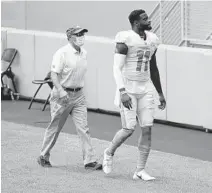  ?? LYNNE SLADKY/AP ?? Dolphins wide receiver DeVante Parker walks off the field during the first half of Sunday’s game against the Seahawks.