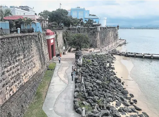  ?? DEAN LISK PHOTOS FOR THE HAMILTON SPECTATOR ?? Walking tours through Old San Juan take visitors to historic sites and eateries that are part of a movement toward traditiona­l cuisine and locally sourced ingredient­s.