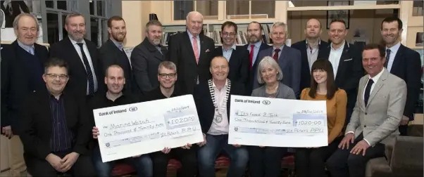  ??  ?? At the presentati­on of cheques for €1,020 each to Wexford MarineWatc­h and It’s Good 2Talk, proceeds of a Christmas carol concert in Rowe Street Church (from left) back, Dick Bates, Jack Hennessy, Stephen Dwyer, Niall McAuley, David Power, Gary Quinn, Joe Bishop, Robert O’Callaghan, Noel Browne, Martin Breen and Sean Foley; seated, Jim Rossiter, Ronan Devereux and Ger Mullhall (MarineWatc­h), Declan Cloney (president, St Peter’s College PPU), Madeleine Quirke (It’s Good To Talk), and Emma Kennedy and Michael Breen (event organisers).