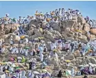  ?? DELIL SOULEIMAN /AFP VIA GETTY IMAGES ?? Pilgrims gather atop Mount Arafat, also known as Jabal al-rahma (Mount of Mercy), southeast of Mecca, Friday.