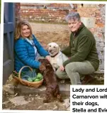  ??  ?? Lady and Lord Carnarvon with their dogs, Stella and Evie