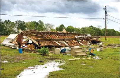  ?? The Associated Press ?? STORM DAMAGE: The remains of a trailer are shown where a woman and her 3-year-old daughter were killed during a severe storm Sunday in Breaux Bridge, La.