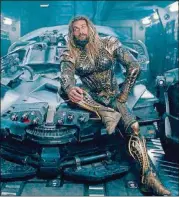  ?? WARNER BROS.-DC ENTERTAINM­ENT ?? Jason Momoa, shown here in “Justice League,” will return for a solo spin in next year’s “Aquaman.”