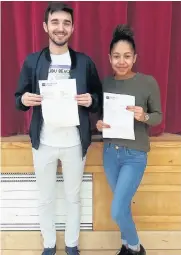  ??  ?? Harlington School pupils Alex Da Camera , who achieved an A*, B and C grade, and Keanna Kempisty, who achieved three A grades