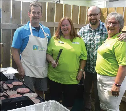  ?? SCOTT ANDERSON/SOUTHWEST BOOSTER ?? The Swift Current Branch of the Canadian Mental Health Associatio­n celebrated their 40th anniversar­y on August 8 with a BBQ and Open House. Board member Laverne Krywulak is joined around the BBQ by CMHA Swift Current Executive Director Jacqui Williams, CMHA Board Vice-president Michael Boutilier and CMHA Board Member Betty Mcdougall.