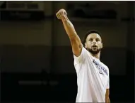  ??  ?? Guard Stephen Curry takes a shot in Monday’s practice with the G League Santa Cruz Warriors in Santa Cruz.