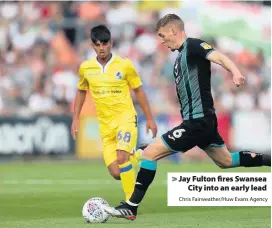  ?? Chris Fairweathe­r/Huw Evans Agency ?? > Jay Fulton fires Swansea City into an early lead