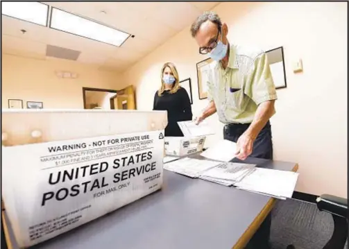  ??  ?? Like most of the country, New York saw record numbers of mail-in ballots in the last election. Now, officials are looking to expand the practice for elections to come and weighing other improvemen­ts to voting.