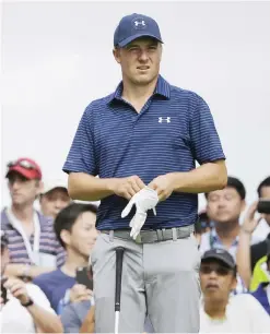  ??  ?? SINGAPORE: Jordan Spieth of the United States prepares to play on the third hole during the final round of the SMBC Singapore Open golf tournament at Sentosa Golf Club’s Serapong Course yesterday, in Singapore. — AP