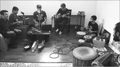  ??  ?? Nepali band ‘Night’ gather for a rehearsal with retro instrument­s.