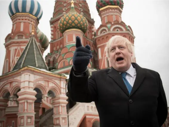  ??  ?? Boris Johnson, seen here in Moscow in December, yesterday said: ‘The trail of responsibi­lity leads back to the Kremlin’ (Getty)