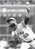  ?? Michael Wyke/Associated Press ?? ■ Houston Astros’ starting pitcher Dallas Keuchel throws against the Texas Rangers on Sunday.