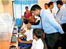  ??  ?? Students use new Computer Laboratory at Galagama MahaVidyal­aya-Nakulugamu­wa.