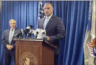  ?? FARNOUSH AMIRI — THE ASSOCIATED PRESS ?? Acting U.S. Attorney Vipal J. Patel, center, accompanie­d by FBI Special Agent in Charge Chris Hoffman, speaks during a news conference in Cincinnati, Thursday, July 22.