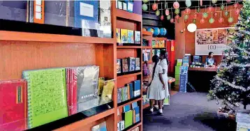  ?? Pic by Akila Jayawarden­a ?? Prices of textbooks have already doubled owing to the weak rupee, and the VAT would be imposed on top of it.