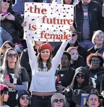  ?? JOHN LOCHER/THE ASSOCIATED PRESS ?? People cheer during a women’s march rally Sunday in Las Vegas, Nev.