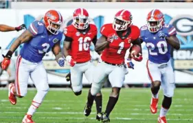  ?? JOHN KELLEY/GEORGIA PHOTO ?? Georgia’s senior tailback tandem of Sony Michel, shown here in 2015, and Nick Chubb has not experience­d much success against the Florida Gators. The Bulldogs averaged 1.1 yards per carry in last year’s loss.