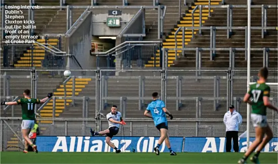  ?? ?? Losing interest: Dublin’s Stephen Cluxton kicks out the ball in front of an empty terrace at Croke Park
