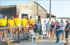  ?? ?? american ambassador Judith Garber, third from right, took part in a beach clean-up and sea turtle release