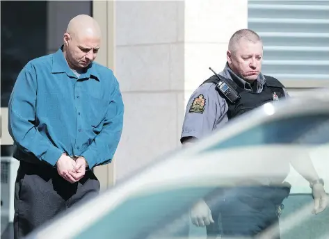  ?? TROY FLEECE ?? Christophe­r Guy Macgregor leaves court in Regina on Wednesday on his way to prison after apologizin­g to the family of the man he killed.