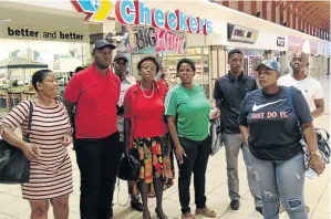  ?? /ANTONIO MUCHAVE ?? Some of Checkers store employees in Mokopane, Limpopo, who have accused management of dismissing them without any warning. They also complained of sexual harassment by the manager.