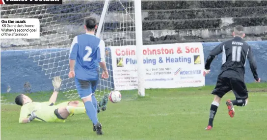  ??  ?? On the mark KB Grant slots home Wishaw’s second goal of the afternoon