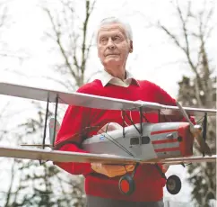  ?? Jason Franson / The Cana dian Press Files ?? Aviation pioneer Max Ward had a model of his first plane, the de Havilland Fox Moth. Ward died at age 98.