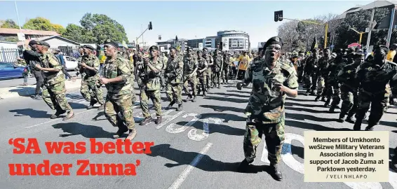  ?? / VELI NHLAPO ?? Members of Umkhonto weSizwe Military Veterans Associatio­n sing in support of Jacob Zuma at Parktown yesterday.