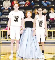  ??  ?? Sophomore maid Logan Meadors, daughter of Angela Meadors, escorted by Jake Webb (left), son of Kelly Ray and Lisa Webb; and Gabe Foster, son of Cassaundra and Tony Barrientez, Jr.