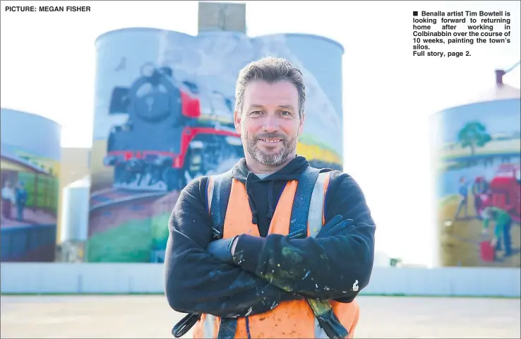  ?? PICTURE: MEGAN FISHER ?? ■ Benalla artist Tim Bowtell is looking forward to returning home after working in Colbinabbi­n over the course of 10 weeks, painting the town’s silos.