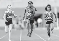  ?? William Luther / Staff photograph­er ?? Hunter Simmons, from left, Jasmine Montgomery and Madeline Mcelroy led Reagan to its fifth straight 28-6A title Thursday.