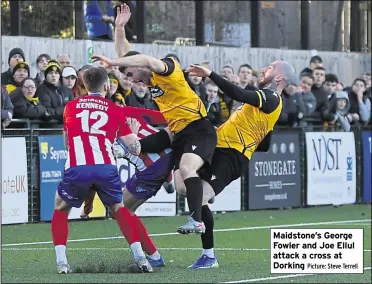  ?? Picture: Steve Terrell ?? Maidstone’s George Fowler and Joe Ellul attack a cross at Dorking