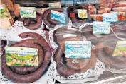  ?? ?? Blood line: ‘boudin noir’ for sale in Mortagne-auPerche, where the annual black pudding festival has been cancelled