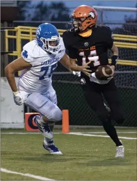  ?? PHOTOS BY TIMOTHY ARRICK — FOR MEDIANEWS GROUP, FILE ?? Detroit Catholic Central lineman Bruno Guberinich (75) recently committed to playing college football for Central Michigan University.