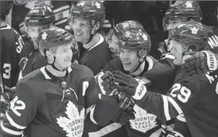  ?? FRANK GUNN, THE CANADIAN PRESS ?? Toronto Maple Leafs’ Tyler Bozak (42) celebrates his goal against San Jose in the shootout. The Leafs won, 3-2.